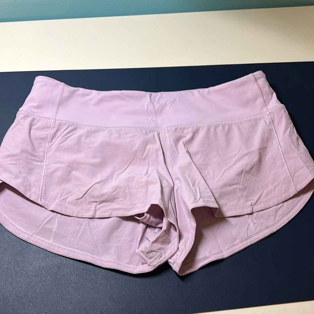 Light purple Lululemon speed up shorts 2” in very good used condition